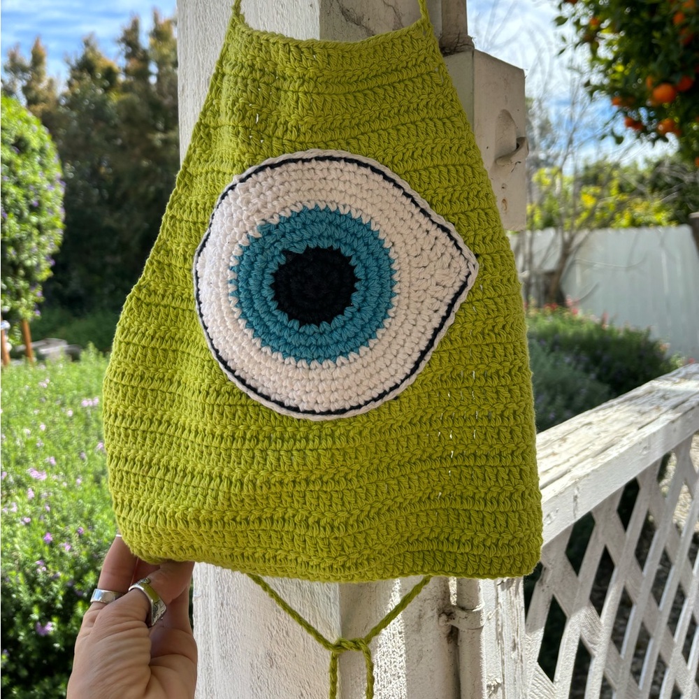 Never been worn crocheted halter top with tie back! One of a kind handmade